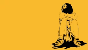 Bild eines kauernden Kindes vor gelbem Hintergrund.